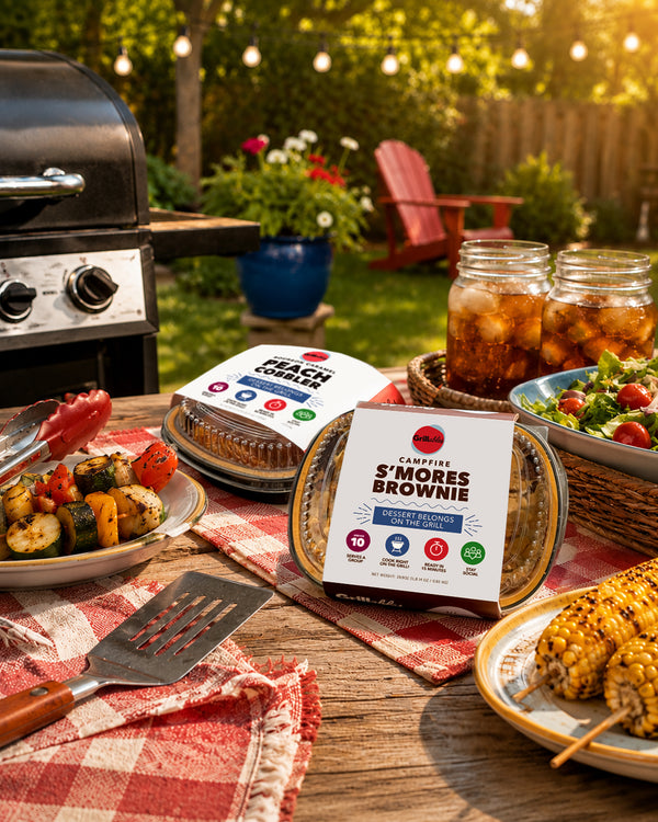 Grillables Peach Cobbler and S'Mores Brownie set up for a backyard cookout